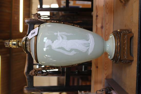 A French paté-sur-paté celadon ground and gilt metal mounted lamp base, late 19th century, total height 46cm